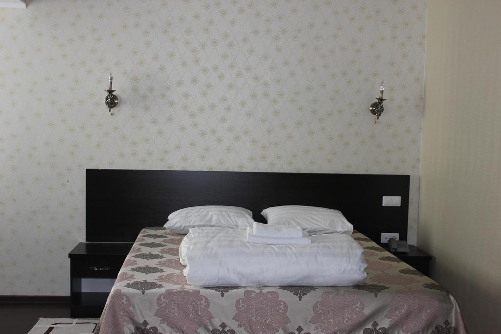 Home Hotel Astana Værelse billede